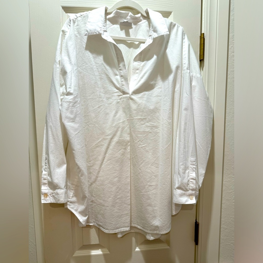 Gently worn white cotton blouse
